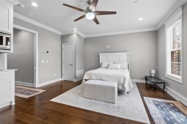 bedroom featuring wood finished floors, baseboards, recessed lighting, ornamental molding, and ceiling fan