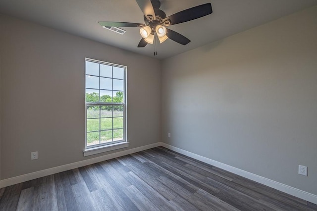 190 Madison Unit 6124, Elkins, AR 72727 - empty room with baseboards, dark wood-type flooring, and a ceiling fan