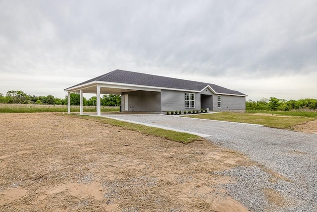 190 Madison Unit 6124, Elkins, AR 72727 - single story home with driveway, a carport, and a front lawn