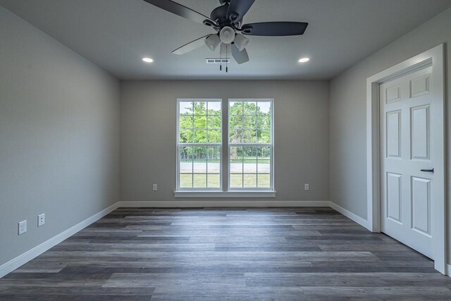 190 Madison Unit 6124, Elkins, AR 72727 - unfurnished room featuring a ceiling fan, baseboards, recessed lighting, and dark wood-type flooring
