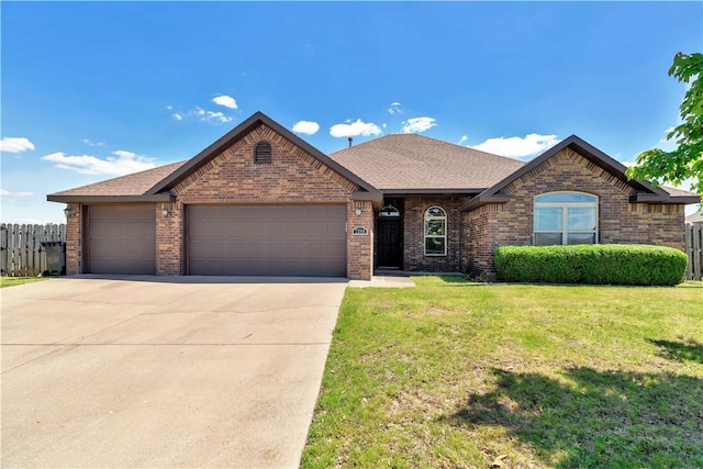 ranch-style home featuring brick siding, an attached garage, driveway, and roof with shingles