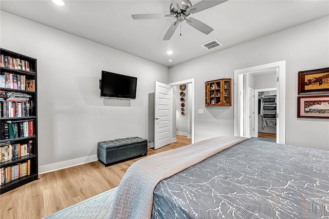 2227 Riggins Ave, Pea Ridge, AR 72751 - bedroom featuring wood finished floors, baseboards, recessed lighting, and ceiling fan