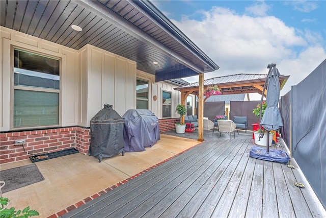 2227 Riggins Ave, Pea Ridge, AR 72751 - deck featuring a gazebo, a grill, a fenced backyard, and outdoor lounge area