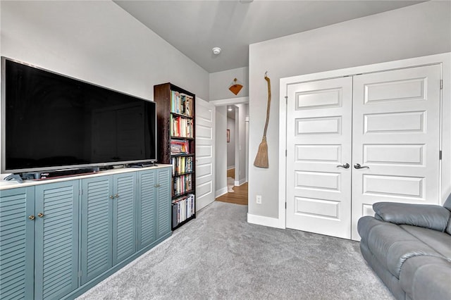 2227 Riggins Ave, Pea Ridge, AR 72751 - carpeted living area with baseboards