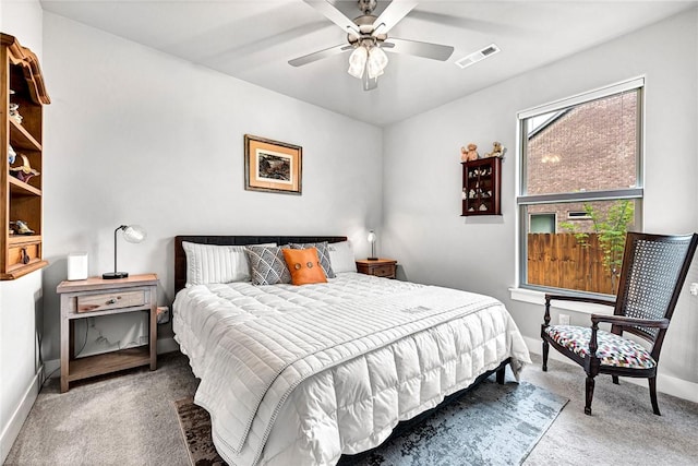 2227 Riggins Ave, Pea Ridge, AR 72751 - carpeted bedroom featuring baseboards and ceiling fan