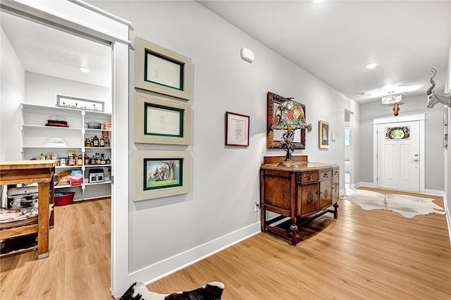 2227 Riggins Ave, Pea Ridge, AR 72751 - entryway featuring light wood-type flooring, baseboards, and recessed lighting
