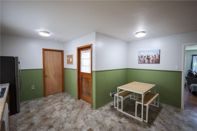 910 Sunset Ln, Harrison, AR 72601 - dining space featuring a wainscoted wall