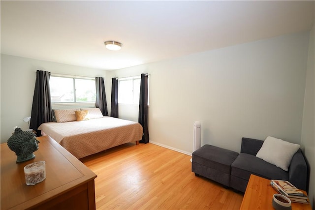 910 Sunset Ln, Harrison, AR 72601 - bedroom featuring light wood finished floors and baseboards