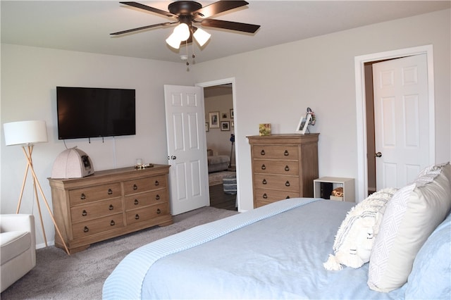 bedroom featuring carpet floors, ceiling fan, and baseboards