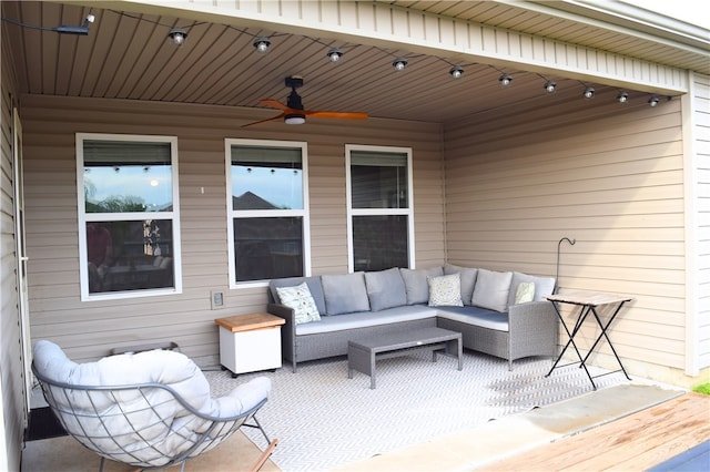view of patio featuring outdoor lounge area, ceiling fan, and a wooden deck