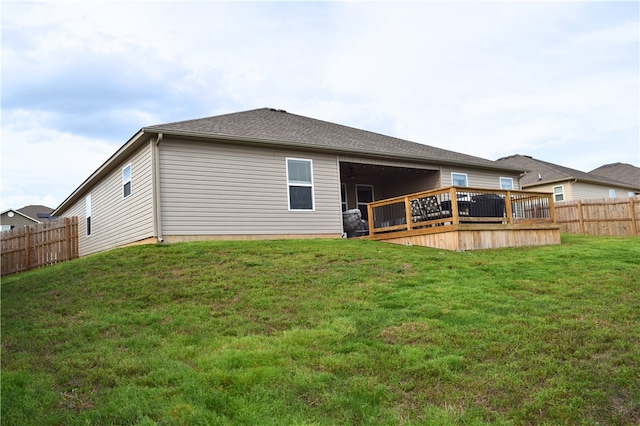 rear view of house with a deck