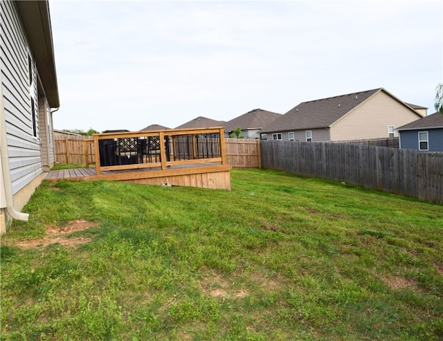 view of yard featuring a deck