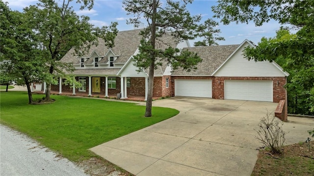 15533 Haynes Rd, Rogers, AR 72756 - cape cod home featuring driveway, an attached garage, a front lawn, and brick siding
