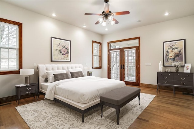 15533 Haynes Rd, Rogers, AR 72756 - bedroom featuring wood finished floors, baseboards, recessed lighting, access to exterior, and french doors