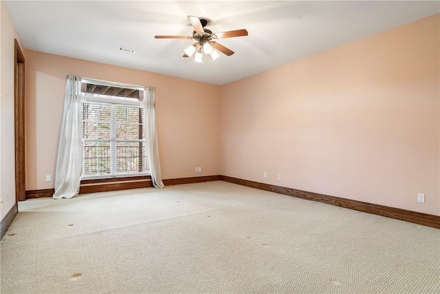 15533 Haynes Rd, Rogers, AR 72756 - unfurnished room featuring baseboards, light colored carpet, and ceiling fan