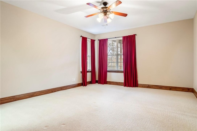 15533 Haynes Rd, Rogers, AR 72756 - empty room featuring light carpet, baseboards, and a ceiling fan