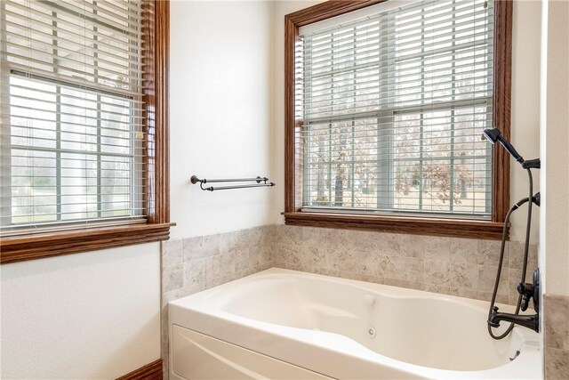 15533 Haynes Rd, Rogers, AR 72756 - bathroom featuring a bath
