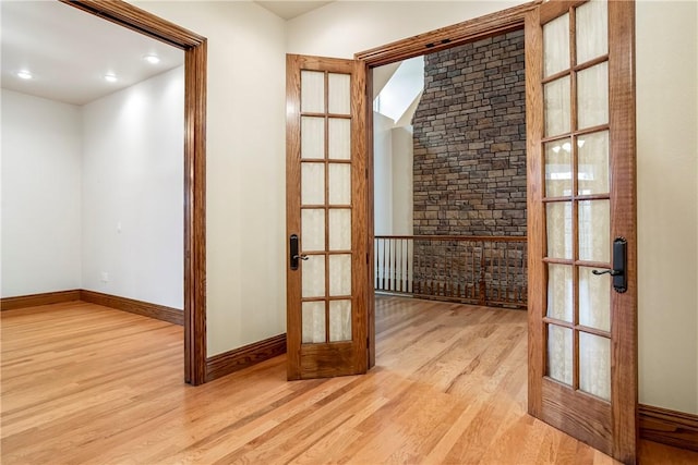 15533 Haynes Rd, Rogers, AR 72756 - entryway with french doors, light wood-type flooring, baseboards, and recessed lighting