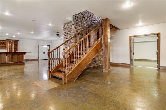15533 Haynes Rd, Rogers, AR 72756 - staircase featuring baseboards, ceiling fan, finished concrete floors, and recessed lighting