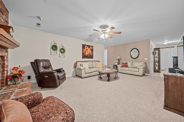 living room featuring carpet flooring, a ceiling fan, and baseboards