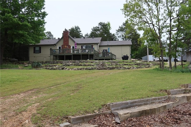 9790 Larkin Ln, Rogers, AR 72756 - view of green lawn with a wooden deck