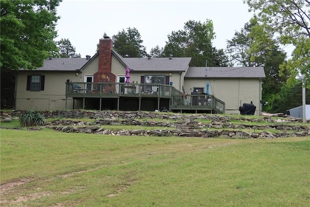 9790 Larkin Ln, Rogers, AR 72756 - rear view of house featuring a deck, a yard, and a chimney