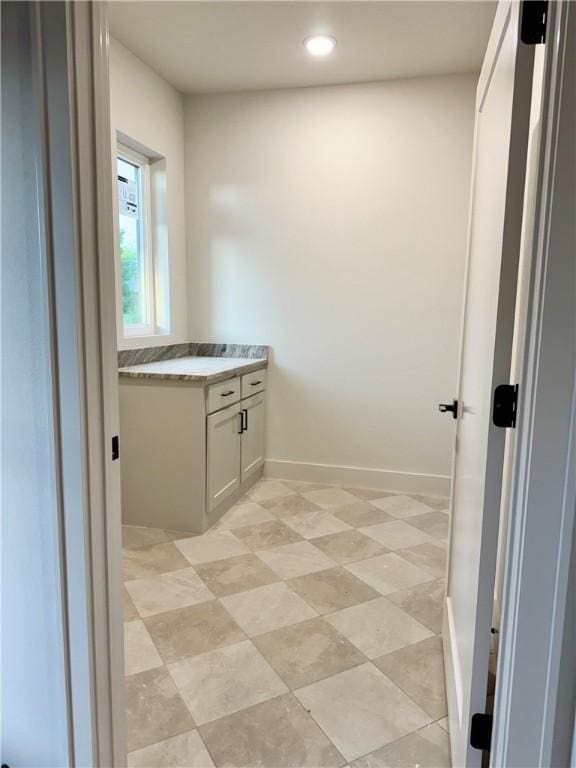 502 Concord St, Lowell, AR 72745 - bathroom with vanity, recessed lighting, and baseboards