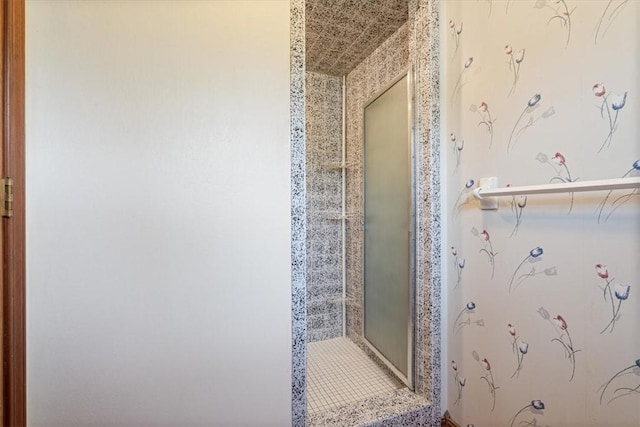 bathroom featuring a stall shower