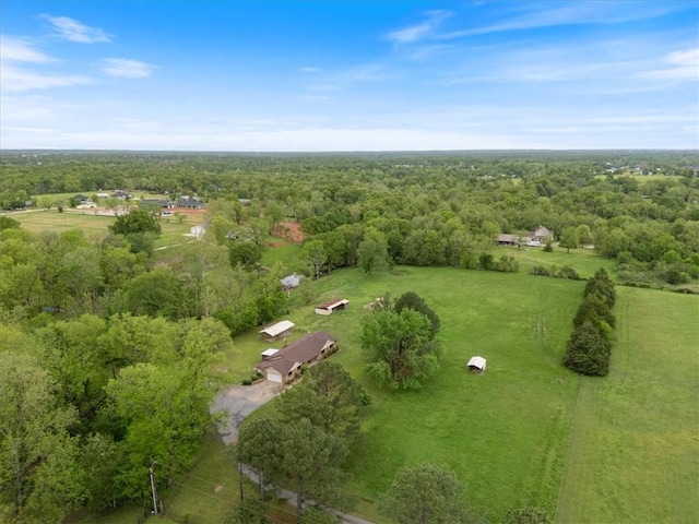 aerial overview of property's location featuring a forest