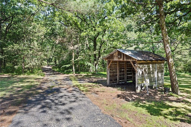10616 S Liberty Rd, Dardanelle, AR 72834 - view of pole building featuring a view of trees