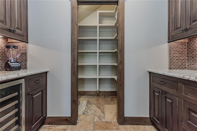 7 W Colonial Dr, Rogers, AR 72758 - storage area with wine cooler