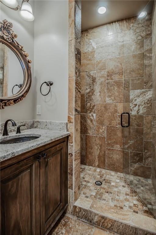 7 W Colonial Dr, Rogers, AR 72758 - bathroom featuring a shower stall and vanity