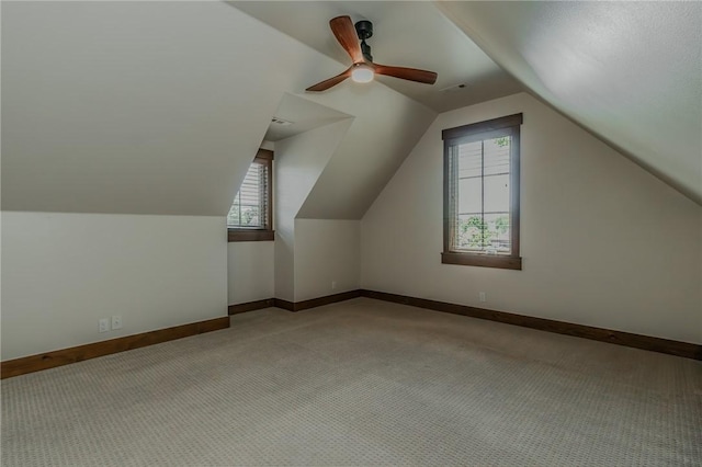 7 W Colonial Dr, Rogers, AR 72758 - bonus room with light colored carpet, baseboards, vaulted ceiling, and ceiling fan