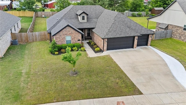 view of front of house featuring brick siding, a garage, a shingled roof, and driveway