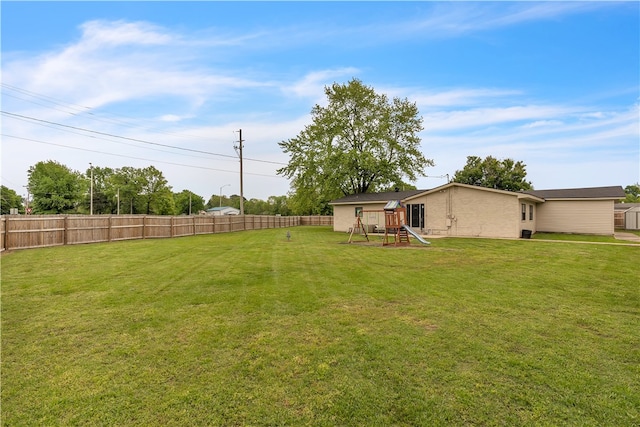 view of yard featuring a playground