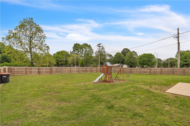 view of yard with a playground