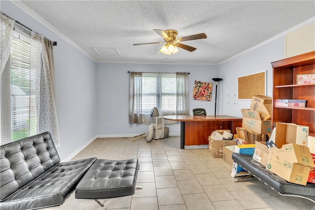 office space featuring ceiling fan, a textured ceiling, crown molding, and light tile patterned floors