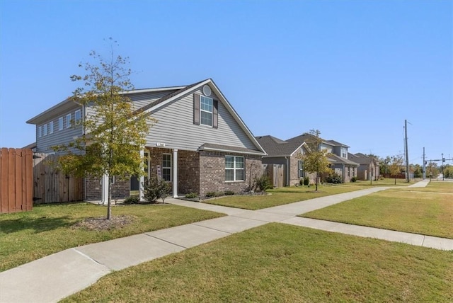 view of front of house featuring brick siding