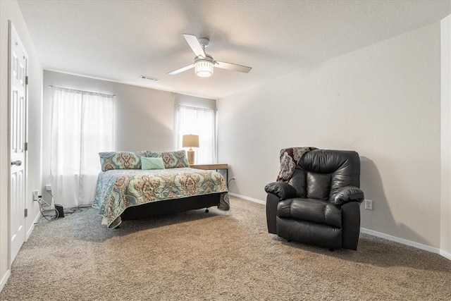 bedroom featuring carpet floors, ceiling fan, and baseboards