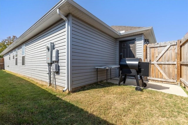view of property exterior with a gate