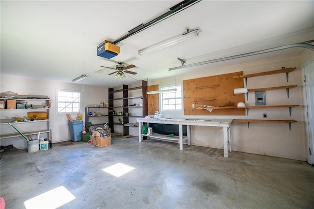 307 E Edmondson Ave, Springdale, AR 72764 - garage with a workshop area, a garage door opener, and electric panel