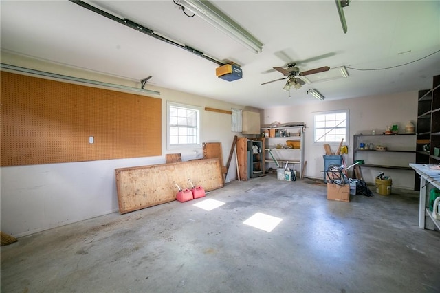 307 E Edmondson Ave, Springdale, AR 72764 - garage featuring a garage door opener and ceiling fan