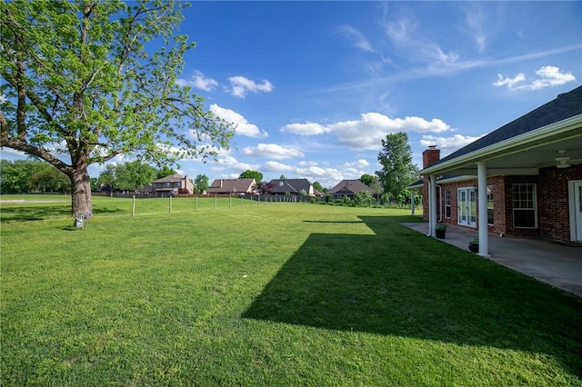 307 E Edmondson Ave, Springdale, AR 72764 - view of green lawn featuring a patio and ceiling fan
