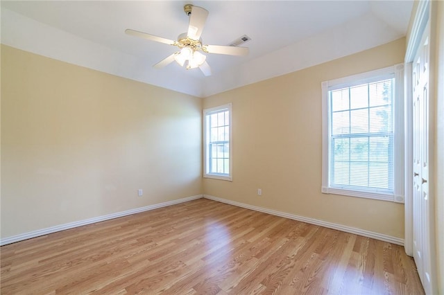 307 E Edmondson Ave, Springdale, AR 72764 - empty room featuring light wood-style flooring, baseboards, and a ceiling fan