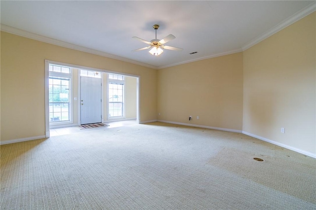 307 E Edmondson Ave, Springdale, AR 72764 - unfurnished room featuring baseboards, light colored carpet, ceiling fan, and ornamental molding