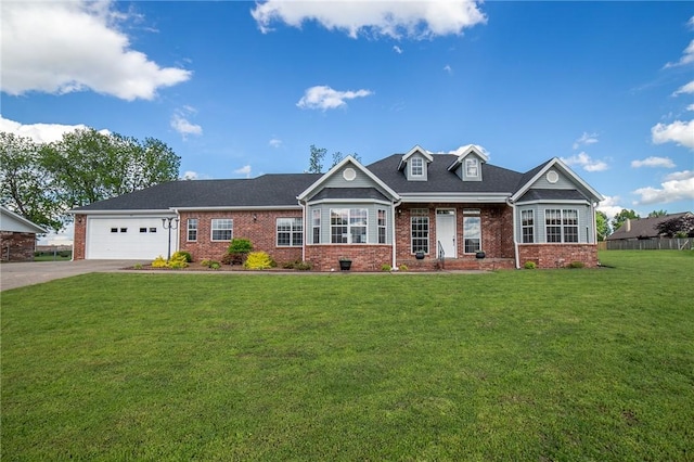 307 E Edmondson Ave, Springdale, AR 72764 - view of front of home with brick siding, concrete driveway, a garage, and a front lawn