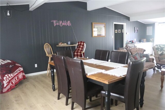 dining space featuring wood finished floors