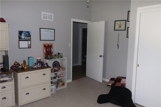 bedroom with light carpet