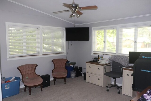 office area featuring ceiling fan, plenty of natural light, ornamental molding, light colored carpet, and lofted ceiling