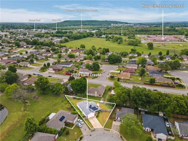 aerial perspective of suburban area featuring property boundaries highlighted